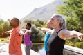 Mature group of people doing breathing exercise Royalty Free Stock Photo