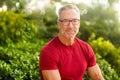 Mature handome fit man sitting outside stock photo