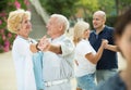 Mature friends dancing walts