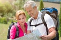 Mature Hiker Looking At Map Royalty Free Stock Photo