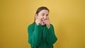 Mature hispanic woman with grey hair smiling confident pointing with fingers to the camera over isolated yellow background Royalty Free Stock Photo