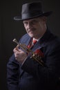 Mature Jazz man holding a trumpet Royalty Free Stock Photo