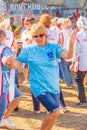 Mature Komsomol members dance on the military-patriotic site of the Grushinskaya Polyana.