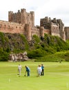 Mature ladies playing croquet in a rural setting in Northumbria, England