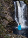 Mature Lady by the waterfalls