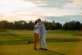 Mature loving couple hugging on the field. Royalty Free Stock Photo