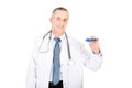 Mature male doctor holding a thermometer Royalty Free Stock Photo