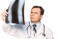 Mature male doctor radiologist studying patient's