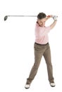 Mature Male Golfer Swinging Golf Club Royalty Free Stock Photo