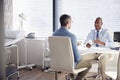 Mature Male Patient In Consultation With Doctor In Office Royalty Free Stock Photo