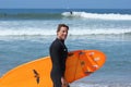 Mature male stays fit surfing