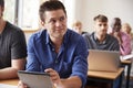 Mature Male Student With Digital Tablet In Adult Education Class Royalty Free Stock Photo