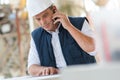 mature male supervisor looking at clipboard Royalty Free Stock Photo