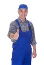 Mature male technician making thumbs up gesture