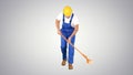 Mature Male Worker Cleaning Floor With Mop on gradient backgroun Royalty Free Stock Photo