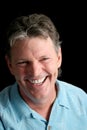 Mature Man on Black - Laughter Royalty Free Stock Photo