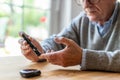 Mature Man Checking Blood Sugar Level Royalty Free Stock Photo