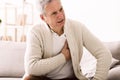 Mature man with chest pain, suffering from heart attack Royalty Free Stock Photo