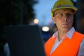 Mature man construction worker at the construction site in the c Royalty Free Stock Photo