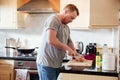 Man Chopping Onions for a Bolognese