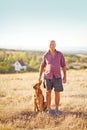 Mature man with dog Royalty Free Stock Photo