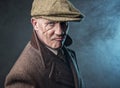 Mature man dressed as an English 1920s gangster Royalty Free Stock Photo