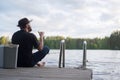 Mature man fishing from gangway Royalty Free Stock Photo