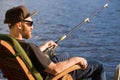 Mature man fishing from pier Royalty Free Stock Photo