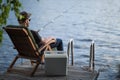 Mature man fishing from pier Royalty Free Stock Photo