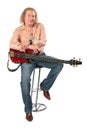 Mature man with guitar Royalty Free Stock Photo