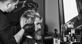 mature man at hairdresser. Hair care and male grooming concept. get perfect shape. bearded man getting beard haircut by