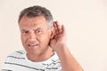 Mature man with hearing problem