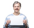 Mature man holding a blank billboard isolated Royalty Free Stock Photo