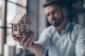 Mature man with a house Royalty Free Stock Photo