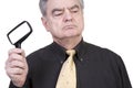 Mature Man with Magnifying Glass Royalty Free Stock Photo