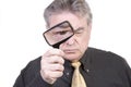 Mature Man with Magnifying Glass Royalty Free Stock Photo