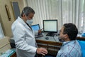 Mature man performing pulmonary function test and spirometry