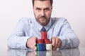 Mature man with poker chips, placing bet Royalty Free Stock Photo