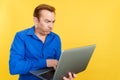 Mature man with a problem with a laptop Royalty Free Stock Photo