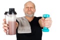 Mature man with protein shake and dumbbell Royalty Free Stock Photo