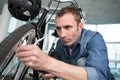 mature man pumping up bike