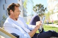 Mature man relaxing in suburban area Royalty Free Stock Photo