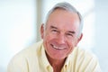 Mature man smiling. Portrait of good looking mature man smiling at you. Royalty Free Stock Photo