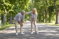 Mature Man Suffering Knee Injury While Walking In Park With Wife Royalty Free Stock Photo