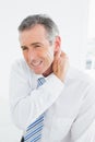 Mature man suffering from neck pain