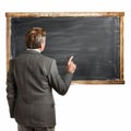 Mature man looking at an empty chalkboard Royalty Free Stock Photo