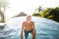 Mature man in a swimming pool Royalty Free Stock Photo