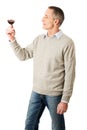 Mature man tasting red wine Royalty Free Stock Photo