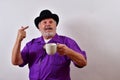 Mature man thinking and planning while drinking coffee Royalty Free Stock Photo