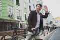 Mature man using bicycle at the city Royalty Free Stock Photo